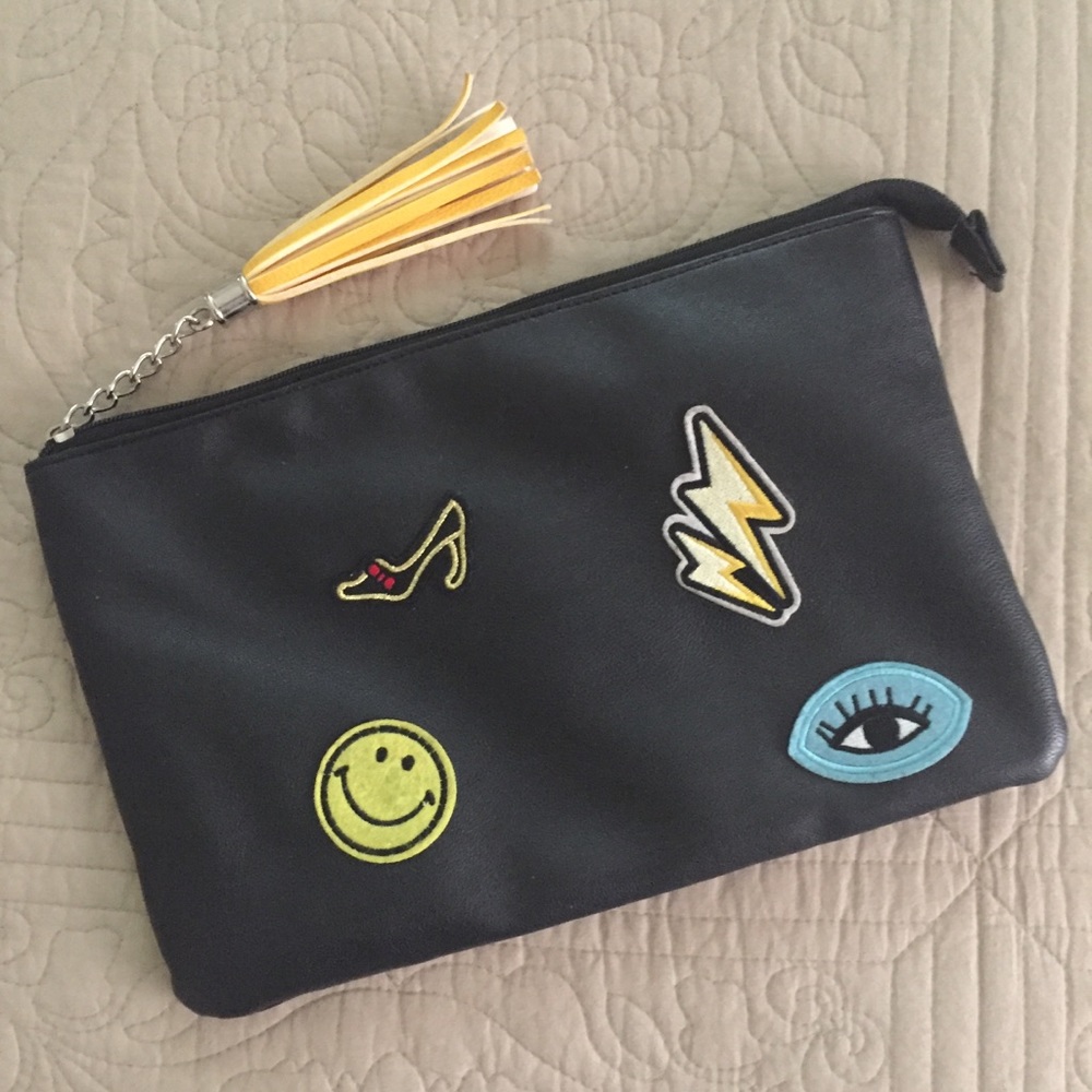 Edgy Clutch Bag with Tassel Zip